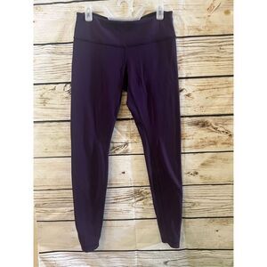 Lululemon wunder under reversible purple Black leggings size 10